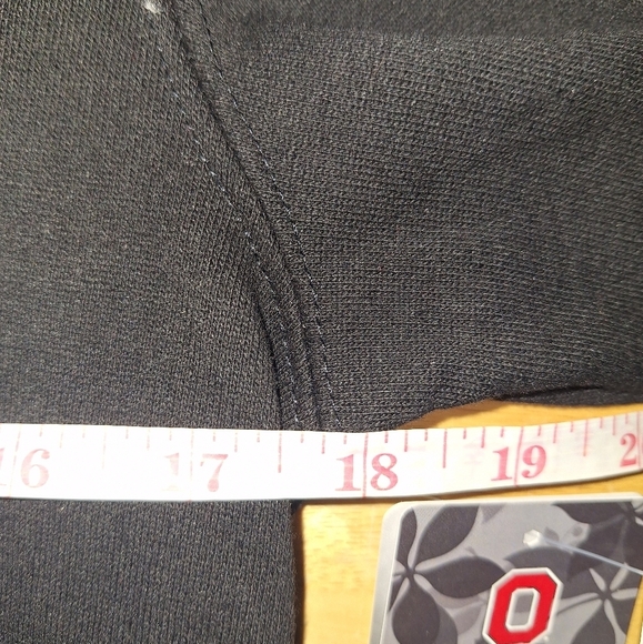 A Colosseum Ohio State Buckeyes black and red hoodie in a youth size medium. - Picture 10 of 11